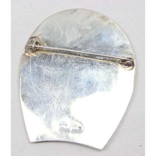 2341 - A vintage 925 silver brooch formed as a horse shoe surrounding a horse racing scene, marked and XRF ... 