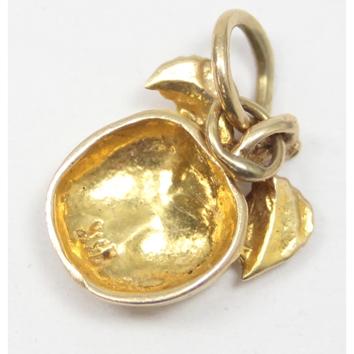 2343 - A 14ct gold pendant or charm formed as an apple, marked 14k and XRF confirmed, approx 1.88g gross