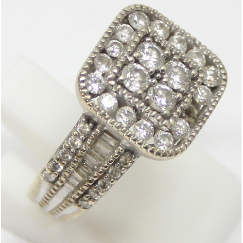 2344 - A 10ct white gold dress ring set with diamonds in a retro style setting, marked 10k and XRF confirme... 