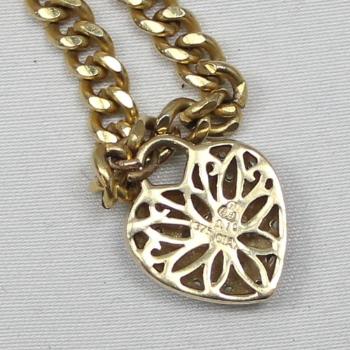 2346 - A 9ct gold and diamond heart shaped pendant on a long gold planted kerb chain, approx 80cm long, app... 