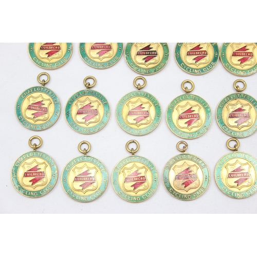 2387 - Charlotteville Cycling Club of Guildford, 19 assorted gold plated and enamel cycling club medals, ma... 