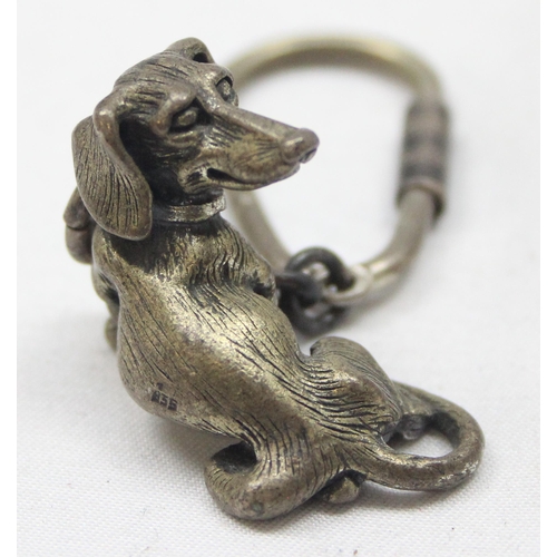 1019 - An Austrian 835 silver model of a Dachshund or Sausage Dog on chain, an early 20th century Austrian ... 