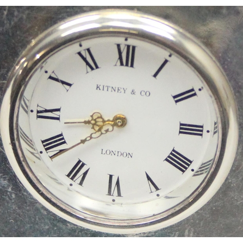 1029 - A silver cased desk clock by Kitney & Co, marked for London 1992, approx 7cm wide