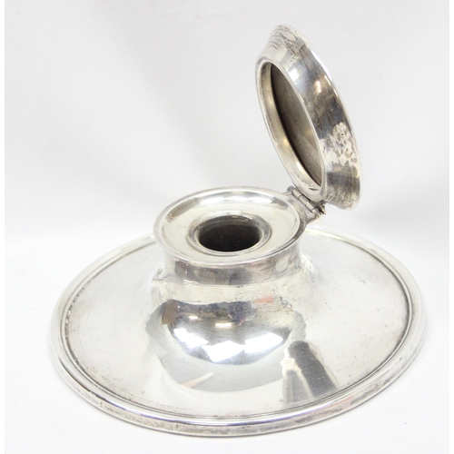 1035 - An unusually large silver capstan inkwell with glass liner, approx 13cm in diameter, Birmingham 1917... 