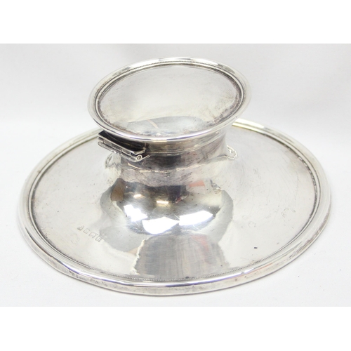 1035 - An unusually large silver capstan inkwell with glass liner, approx 13cm in diameter, Birmingham 1917... 