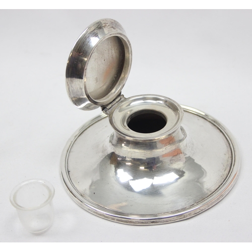 1035 - An unusually large silver capstan inkwell with glass liner, approx 13cm in diameter, Birmingham 1917... 