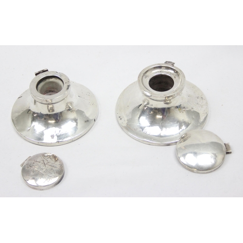 1037 - 2 antique silver capstan inkwells, Birmingham 1910 & 1918, both approx 8.5cm in diameter