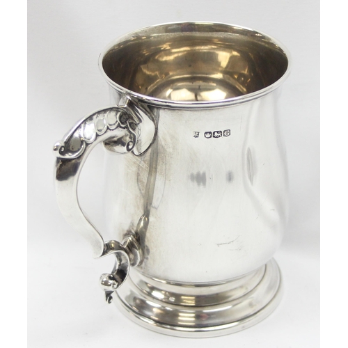 1042 - A solid silver pint tankard, Sheffield 1949 by Poston Products Limited, engraved dedication from Nes... 