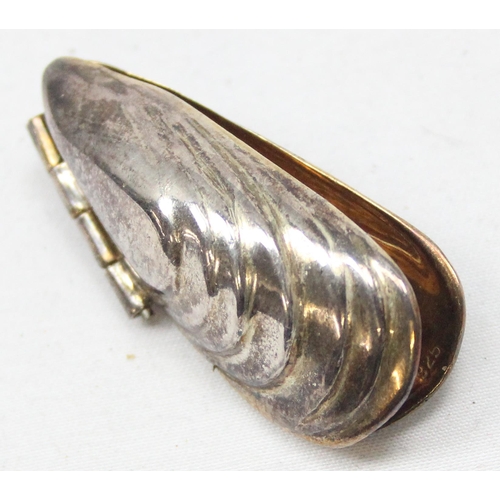 1052 - An unusual small silver item formed as a mussel, for use as a clip to eat mussels, London 2014 by Do... 