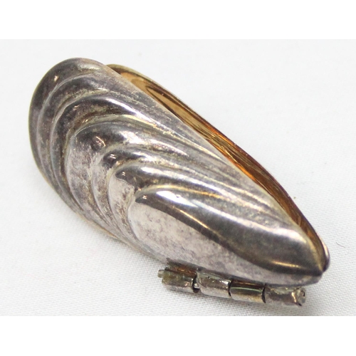 1052 - An unusual small silver item formed as a mussel, for use as a clip to eat mussels, London 2014 by Do... 