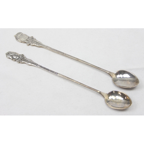 1061 - A pair of long 925 silver spoons, one terminal decorated with Mango, the other with Durian fruit, bo... 