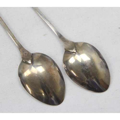 1061 - A pair of long 925 silver spoons, one terminal decorated with Mango, the other with Durian fruit, bo... 