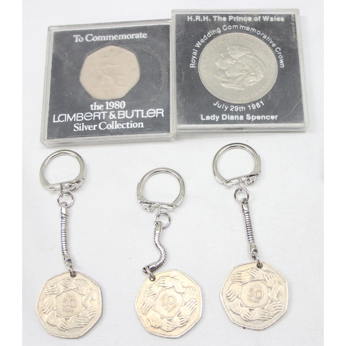 1227 - 3 £5 coins in original packaging, 3 boxed 50p keyrings and 2 other commemorative coins