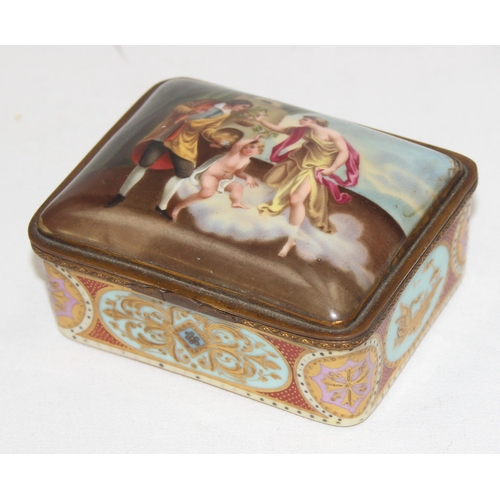 1600 - A 19th century hand painted and gilt porcelain box, possibly by Vienna, the outer lid decorated in t... 