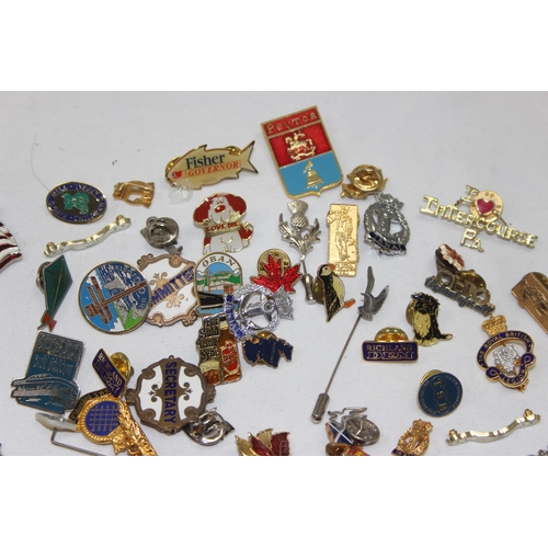 1642 - A large qty of assorted vintage and later pin badges etc to inc some military