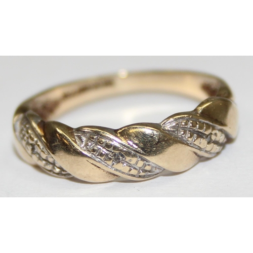 2296 - 9ct white and yellow gold diamond set twisted band ring, English hallmarks, approx size M, approx 2.... 