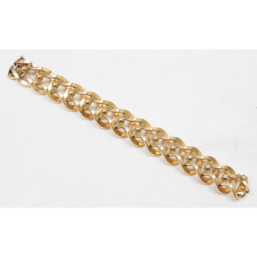 2300 - An Italian 18ct gold retro bracelet with unusual interlocking links and balls, marked FOT 750 and XR... 