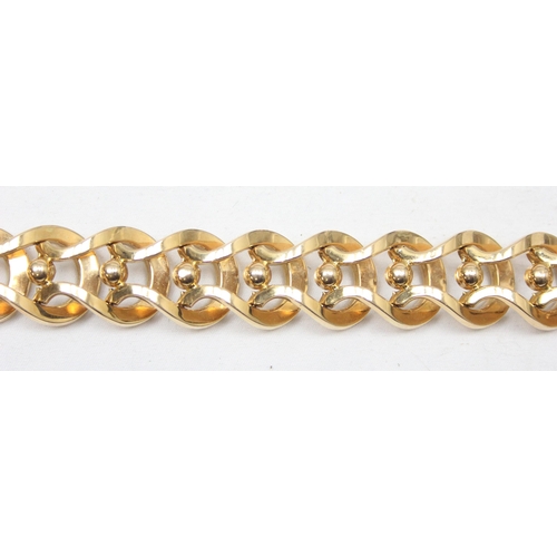 2300 - An Italian 18ct gold retro bracelet with unusual interlocking links and balls, marked FOT 750 and XR... 