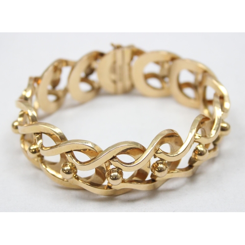 2300 - An Italian 18ct gold retro bracelet with unusual interlocking links and balls, marked FOT 750 and XR... 