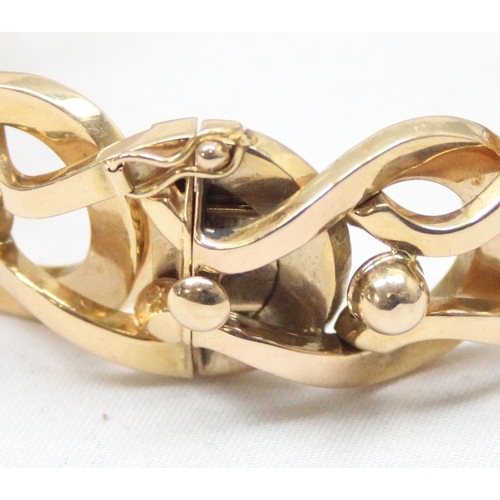 2300 - An Italian 18ct gold retro bracelet with unusual interlocking links and balls, marked FOT 750 and XR... 