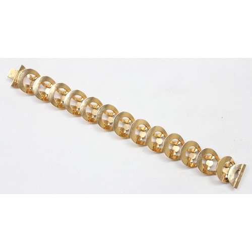 2300 - An Italian 18ct gold retro bracelet with unusual interlocking links and balls, marked FOT 750 and XR... 