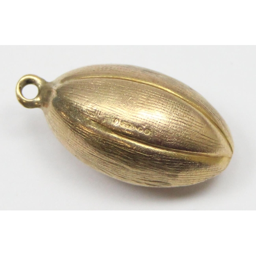 2307 - A vintage 9ct gold pendant or charm formed as a Rugby ball, marked and XRF confirmed, approx 1.45g g... 