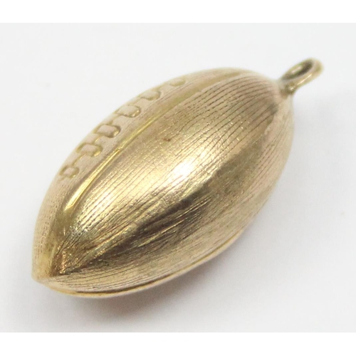 2307 - A vintage 9ct gold pendant or charm formed as a Rugby ball, marked and XRF confirmed, approx 1.45g g... 