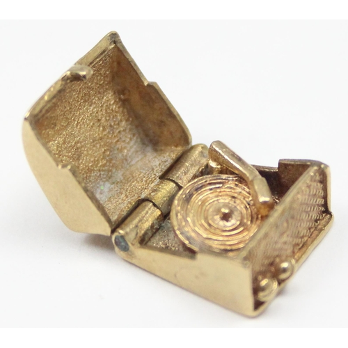 2308 - A vintage 9ct gold pendant or charm formed as a portable record player, marked and XRF confirmed, ap... 