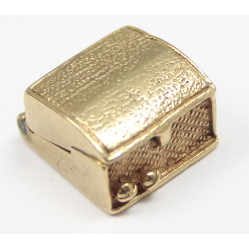 2308 - A vintage 9ct gold pendant or charm formed as a portable record player, marked and XRF confirmed, ap... 