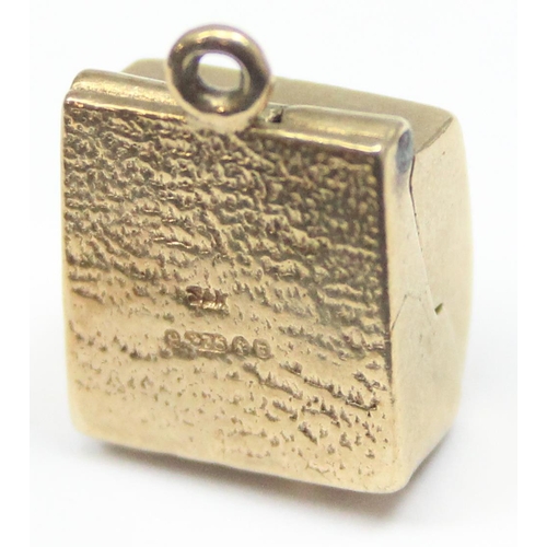 2308 - A vintage 9ct gold pendant or charm formed as a portable record player, marked and XRF confirmed, ap... 