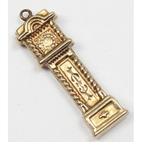 2311 - A vintage 9ct gold pendant or charm formed as a grandfather clock, marked and XRF confirmed, approx ... 