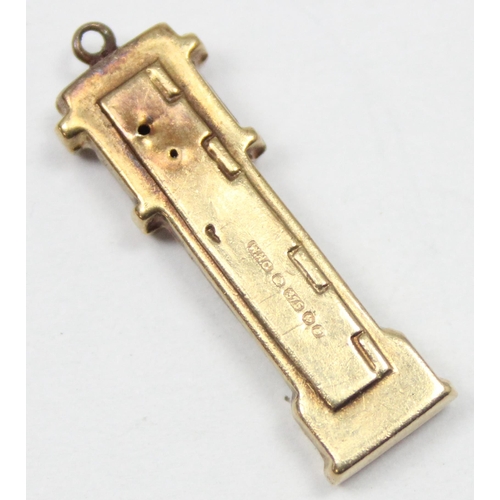 2311 - A vintage 9ct gold pendant or charm formed as a grandfather clock, marked and XRF confirmed, approx ... 