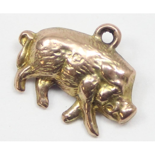 2317 - A vintage 9ct gold pendant or charm formed as a wild boar, marked and XRF confirmed, approx 0.76g gr... 