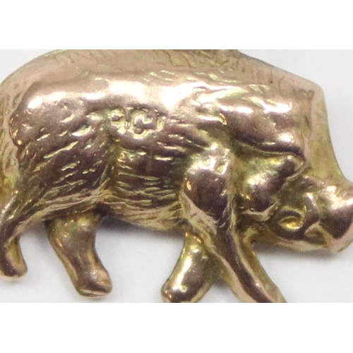 2317 - A vintage 9ct gold pendant or charm formed as a wild boar, marked and XRF confirmed, approx 0.76g gr... 