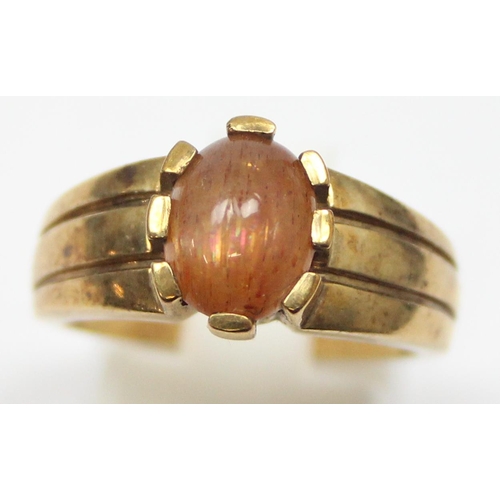 2363 - A 9ct gold and red cabochon stone ring, marked for Birmingham 2006, in Clogau box, approx size O, ap... 