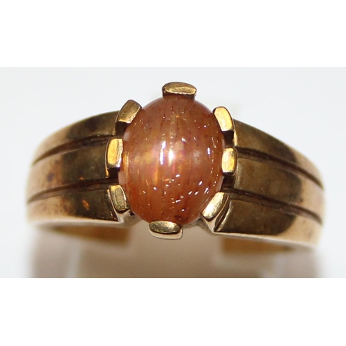 2363 - A 9ct gold and red cabochon stone ring, marked for Birmingham 2006, in Clogau box, approx size O, ap... 