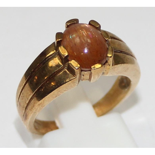 2363 - A 9ct gold and red cabochon stone ring, marked for Birmingham 2006, in Clogau box, approx size O, ap... 