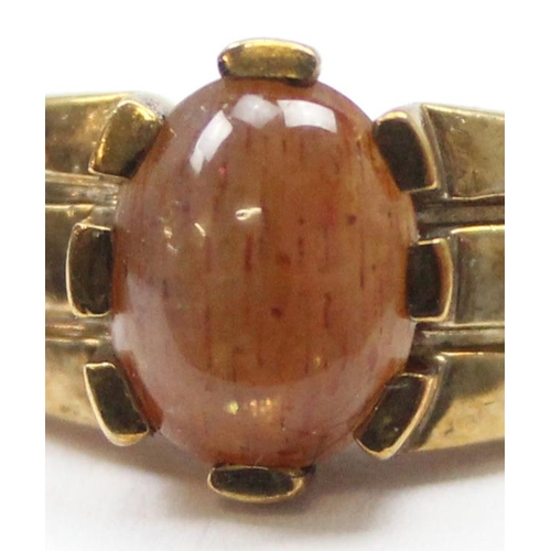 2363 - A 9ct gold and red cabochon stone ring, marked for Birmingham 2006, in Clogau box, approx size O, ap... 