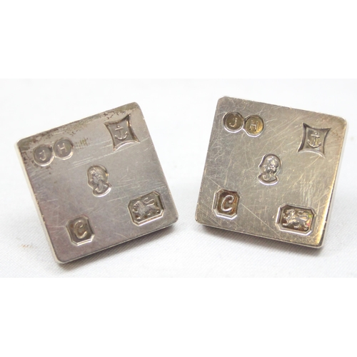 2371 - A pair of heavy gauge silver cufflinks with prominent hallmarks, Birmingham 1977 by James Harrison, ... 