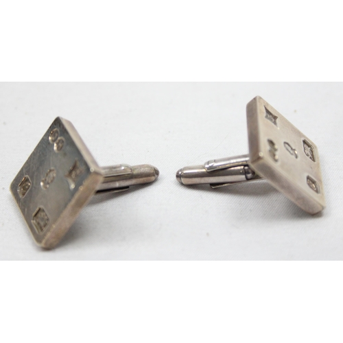 2371 - A pair of heavy gauge silver cufflinks with prominent hallmarks, Birmingham 1977 by James Harrison, ... 