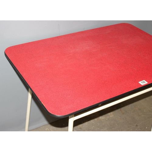 108 - Retro red Formica topped kitchen table on white metal legs, approx 92cm W x 60cm D x 77cmm H