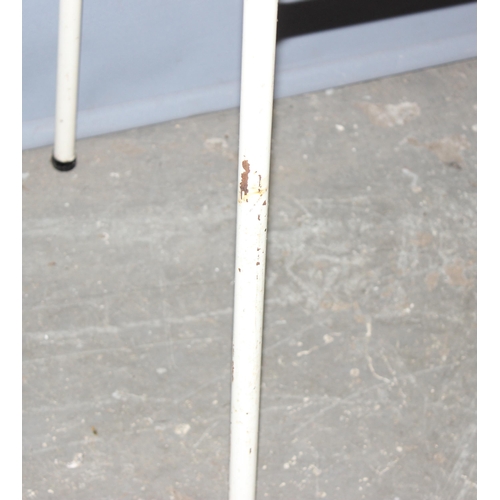 108 - Retro red Formica topped kitchen table on white metal legs, approx 92cm W x 60cm D x 77cmm H