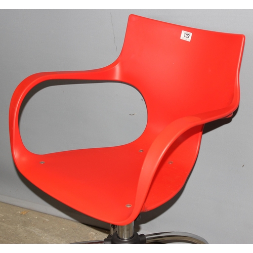 109 - Eames style adjustable red polypropylene office swivel chair on chrome base