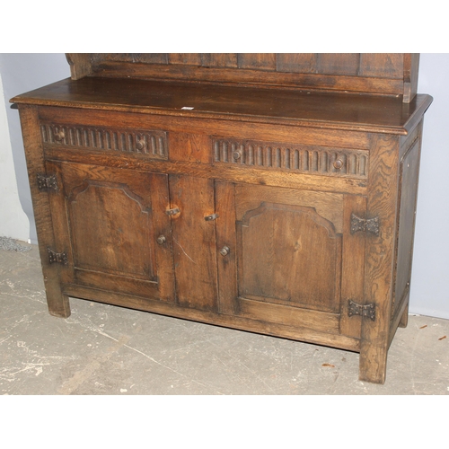 113 - A large vintage Jacobean style oak dresser, approx 146cm wide x 48cm deep x 194cm tall