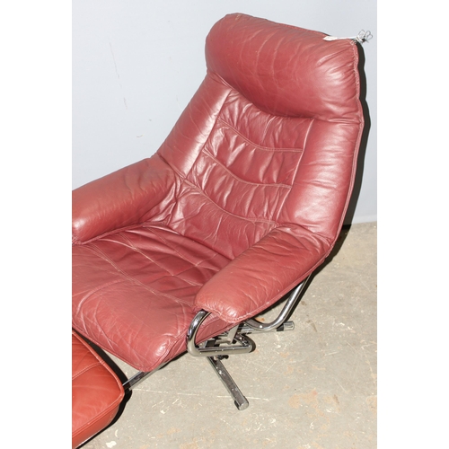 2 - A retro mid-century Skoghaug of Norway Lazyboy style lounge chair with matching footstool, the piece... 