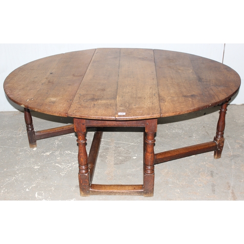 31 - 18th century oak gate legged table, approx 169cm x 142cm x 65cm