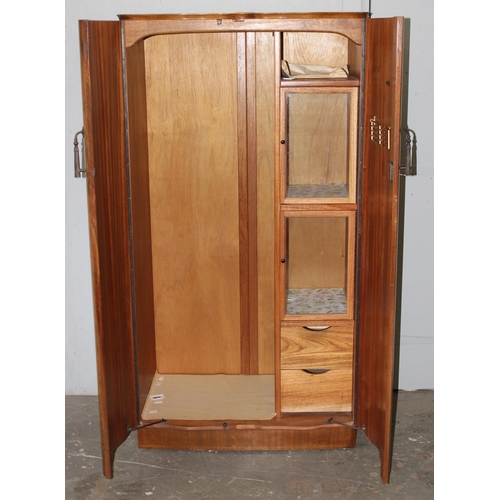 37 - A mid-century walnut veneered wardrobe with interior drawers and compartments, approx 93cm wide x 61... 