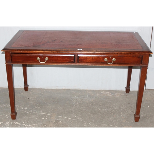 38 - An antique library table with red leather inset top and 2 drawers, approx 137cm wide x 76cm deep x 7... 