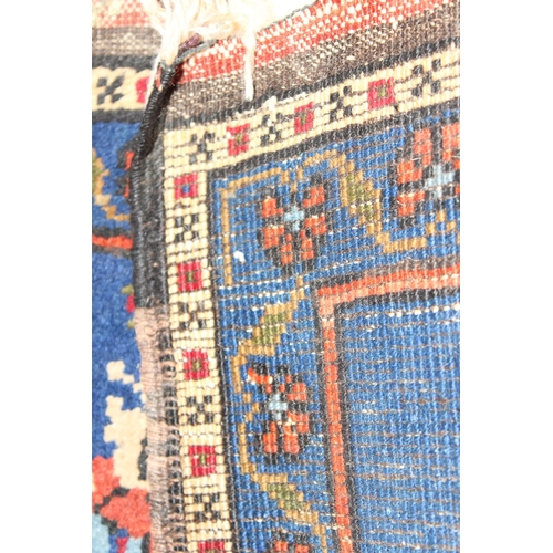 211 - Vintage blue and red natural dye floral design hand woven fringed prayer mat 74cm x 66 cm, and a Sco... 