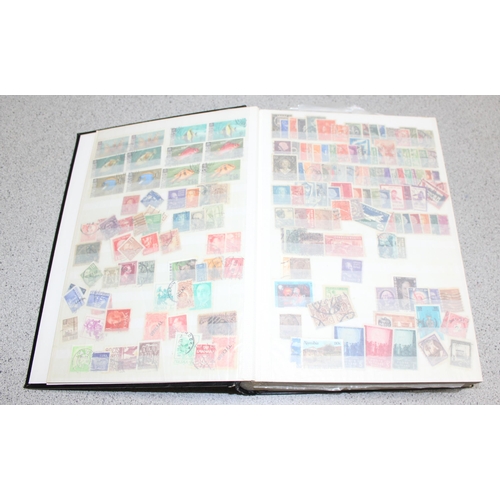 555 - Stamps - World in 64 page stockbook, (1000s)